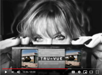 Youtube video still of Jody Shipka holding a view finder