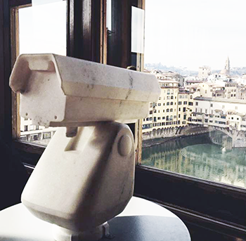 Marble Surveillence Camera looking out on the Ponte Vecchio in Florence Italy